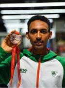 9 December 2019; Efrem Gidey of Ireland poses for a portrait with his bronze medal in the U20 Men's event during the Ireland European Cross Country Team Homecoming at Dublin Airport in Dublin. Photo by Piaras Ó Mídheach/Sportsfile