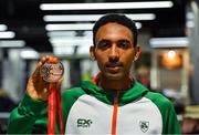 9 December 2019; Efrem Gidey of Ireland poses for a portrait with his bronze medal in the U20 Men's event during the Ireland European Cross Country Team Homecoming at Dublin Airport in Dublin. Photo by Piaras Ó Mídheach/Sportsfile