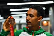 9 December 2019; Efrem Gidey of Ireland poses for a portrait with his bronze medal in the U20 Men's event during the Ireland European Cross Country Team Homecoming at Dublin Airport in Dublin. Photo by Piaras Ó Mídheach/Sportsfile