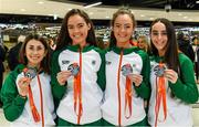 9 December 2019; Members of the silver medal winning U23 women's team, from left, Sorcha McAllister, Róisín Flanagan, Eilish Flanagan, and Claire Fagan during the Ireland European Cross Country Team Homecoming at Dublin Airport in Dublin. Photo by Piaras Ó Mídheach/Sportsfile