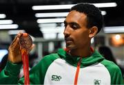 9 December 2019; Efrem Gidey of Ireland poses for a portrait with his bronze medal in the U20 Men's event during the Ireland European Cross Country Team Homecoming at Dublin Airport in Dublin. Photo by Piaras Ó Mídheach/Sportsfile