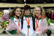 9 December 2019; Members of the silver medal winning senior women's team, from left, Aoibhe Richardson, Una Britton, and Mary Mulhare during the Ireland European Cross Country Team Homecoming at Dublin Airport in Dublin. Photo by Piaras Ó Mídheach/Sportsfile