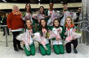 9 December 2019; Athletics Ireland President Georgina Drumm with members of the Ireland team, back row from left, Claire Fagan, Sorcha McAllister, Efrem Gidey, and Una Britton. Front row, from left, Eilish Flanagan, Róisín Flanagan, Aoibhe Richardson, and Mary Mulhare, during the Ireland European Cross Country Team Homecoming at Dublin Airport in Dublin. Photo by Piaras Ó Mídheach/Sportsfile