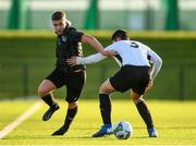11 December 2019; Christian Dooley of FAI-ETB Cabra in action against Jamie Redmond of FAI-ETB Dundalk during the Bobby Smith Cup Round 2 game between FAI-ETB Cabra and FAI-ETB Dundalk at FAI National Training Centre in Dublin. Photo by Eóin Noonan/Sportsfile