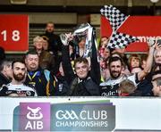 1 December 2019; Kilcoo joint captains Conor Laverty and Aidan Branagan watch the recovering Caelan McEvoy lift the cup after the AIB Ulster GAA Football Senior Club Championship Final match between Kilcoo and Naomh Conaill at Healy Park in Omagh, Tyrone. Photo by Oliver McVeigh/Sportsfile