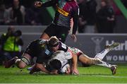 13 December 2019; John Cooney of Ulster dives over to score his side's first try, despite the tackle of James Chisholm of Harlequins, during the Heineken Champions Cup Pool 3 Round 4 match between Harlequins and Ulster at Twickenham Stoop in London, England. Photo by Seb Daly/Sportsfile