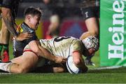 13 December 2019; Luke Marshall of Ulster dives over to score his side's second try, despite the tackle of Cadan Murley of Harlequins, during the Heineken Champions Cup Pool 3 Round 4 match between Harlequins and Ulster at Twickenham Stoop in London, England. Photo by Seb Daly/Sportsfile