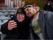 13 December 2019; Rob Herring of Ulster takes a selfie with a supporter following their side's victory during the Heineken Champions Cup Pool 3 Round 4 match between Harlequins and Ulster at Twickenham Stoop in London, England. Photo by Seb Daly/Sportsfile
