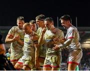 13 December 2019; Matt Faddes of Ulster, second left, is congratulated by team-mates after scoring his side's fourth try during the Heineken Champions Cup Pool 3 Round 4 match between Harlequins and Ulster at Twickenham Stoop in London, England. Photo by Seb Daly/Sportsfile