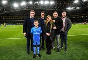 14 December 2019; Mascot 10 year old Jamie Winston, from Greystones, Co. Wicklow, with Leinster players Dan Leavy and Jonathan Sexton at the Heineken Champions Cup Pool 1 Round 4 match between Leinster and Northampton Saints at the Aviva Stadium in Dublin. Photo by Ramsey Cardy/Sportsfile