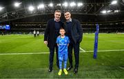 14 December 2019; Mascot 10 year old Felix Kehoe, from Ratoath, Co. Meath, with Leinster players Dan Leavy and Jonathan Sexton at the Heineken Champions Cup Pool 1 Round 4 match between Leinster and Northampton Saints at the Aviva Stadium in Dublin. Photo by Ramsey Cardy/Sportsfile