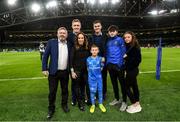 14 December 2019; Mascot 10 year old Felix Kehoe, from Ratoath, Co. Meath, with Leinster players Dan Leavy and Jonathan Sexton at the Heineken Champions Cup Pool 1 Round 4 match between Leinster and Northampton Saints at the Aviva Stadium in Dublin. Photo by Ramsey Cardy/Sportsfile