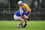15 December 2019; Jason Forde of Tipperary and Jack Browne of Clare tussle off the ball, before both being shown yellow cards by referee Colm Lyons, during the Co-op Superstores Munster Hurling League 2020 Group A match between Tipperary and Clare at McDonagh Park in Nenagh, Tipperary. Photo by Piaras Ó Mídheach/Sportsfile
