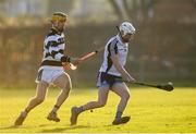 17 December 2019; Kevin Byrne of Dublin North Schools in action against Harry Walsh of St Kieran's College during the Top Oil Leinster Schools Senior A Hurling Championship First Round match between Dublin North Schools and St Kieran's College at Naomh Barróg GAA Club in Kilbarrack, Dublin. Photo by Harry Murphy/Sportsfile