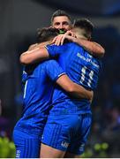 20 December 2019; Cian Kelleher of Leinster celebrates with team-mates Jamison Gibson-Park and Rob Kearney after scoring their side's seventh try during the Guinness PRO14 Round 8 match between Leinster and Ulster at the RDS Arena in Dublin. Photo by Brendan Moran/Sportsfile