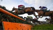 27 December 2019; Runners and riders jump the last first time round during the Paddy Power Steeplechase during Day Two of the Leopardstown Christmas Festival 2019 at Leopardstown Racecourse in Dublin. Photo by David Fitzgerald/Sportsfile