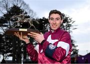 28 December 2019; Jack Kennedy with the trophy after riding Delta Work to win the Savills Chase during Day Three of the Leopardstown Christmas Festival 2019 at Leopardstown Racecourse in Dublin. Photo by Harry Murphy/Sportsfile