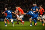 28 December 2019; Shane Daly of Munster is tackled by Hugo Keenan and Rowan Osborne of Leinster during the Guinness PRO14 Round 9 match between Munster and Leinster at Thomond Park in Limerick. Photo by Diarmuid Greene/Sportsfile