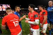 28 December 2019; Adam Byrne of Leinster and Joey Carbery of Munster following the Guinness PRO14 Round 9 match between Munster and Leinster at Thomond Park in Limerick. Photo by Ramsey Cardy/Sportsfile