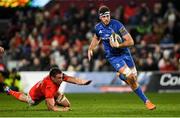 28 December 2019; Caelan Doris of Leinster in action against Tommy O'Donnell of Munster during the Guinness PRO14 Round 9 match between Munster and Leinster at Thomond Park in Limerick. Photo by Ramsey Cardy/Sportsfile