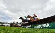 29 December 2019; Best Behaviour, with Barry Browne up, right, jump the last alongside Fiveaftermidnight, with PJ O'Hanlon up, on their way to winning the Tote Supporting Leopardstown Maiden Hurdle during Day Four of the Leopardstown Christmas Festival 2019 at Leopardstown Racecourse in Dublin. Photo by David Fitzgerald/Sportsfile
