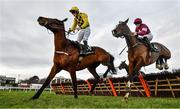 29 December 2019; The Big Getaway, with Paul Townend up, lead the eventual winner Cobbler's Way, with Rachael Blackmore up, over the last during the Pigsback.com Maiden Hurdle on Day Four of the Leopardstown Christmas Festival 2019 at Leopardstown Racecourse in Dublin. Photo by David Fitzgerald/Sportsfile