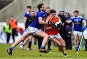 29 December 2019; Niall Grimley of Armagh in action against Kian Monahan of Cavan during the Bank of Ireland Dr McKenna Cup Round 1 match between Cavan and Armagh at Kingspan Breffni in Cavan. Photo by Ben McShane/Sportsfile