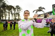 29 December 2019; Patrick Mullins celebrates with the trophy after winning the Matheson Hurdle on Sharjah during Day Four of the Leopardstown Christmas Festival 2019 at Leopardstown Racecourse in Dublin. Photo by David Fitzgerald/Sportsfile