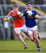 29 December 2019; Ryan Connolly of Cavan in action against Conor Turbit of Armagh during the Bank of Ireland Dr McKenna Cup Round 1 match between Cavan and Armagh at Kingspan Breffni in Cavan. Photo by Ben McShane/Sportsfile