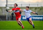 29 December 2019; Padraig Cassidy of Derry in action against Michael Bannigan of Monaghan during the Bank of Ireland Dr McKenna Cup Round 1 match between Monaghan and Derry at Grattan Park in Inniskeen, Monaghan. Photo by Philip Fitzpatrick/Sportsfile