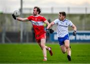 29 December 2019; Padraig Cassidy of Derry in action against Michael Bannigan of Monaghan during the Bank of Ireland Dr McKenna Cup Round 1 match between Monaghan and Derry at Grattan Park in Inniskeen, Monaghan. Photo by Philip Fitzpatrick/Sportsfile