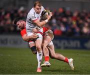 3 January 2020; Will Addison of Ulster is tackled by Sammy Arnold of Munster during the Guinness PRO14 Round 10 match between Ulster and Munster at Kingspan Stadium in Belfast. Photo by Harry Murphy/Sportsfile