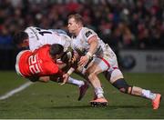 3 January 2020; Dan Goggin of Munster is tackled by Jacob Stockdale and Will Addison of Ulster during the Guinness PRO14 Round 10 match between Ulster and Munster at Kingspan Stadium in Belfast. Photo by Harry Murphy/Sportsfile