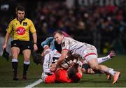 3 January 2020; Dan Goggin of Munster is tackled by Jacob Stockdale and Will Addison of Ulster during the Guinness PRO14 Round 10 match between Ulster and Munster at Kingspan Stadium in Belfast. Photo by Harry Murphy/Sportsfile