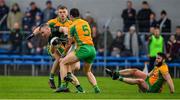 4 January 2020; Conor Horgan of Nemo Rangers in action against Liam Silke and Daithí Burke of Corofin during the AIB GAA Football All-Ireland Senior Club Championship semi-final match between Corofin and Nemo Rangers at Cusack Park in Ennis, Clare. Photo by Brendan Moran/Sportsfile