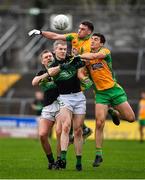 4 January 2020; Alan O'Donovan and James McDermott of Nemo Rangers contest a kickout with Ronan Steede and Daithí Burke of Corofin during the AIB GAA Football All-Ireland Senior Club Championship semi-final match between Corofin and Nemo Rangers at Cusack Park in Ennis, Clare. Photo by Brendan Moran/Sportsfile