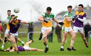 4 January 2020; Jason Dempsey of Offaly in action against Tom Byrne of Wexford during the 2020 O'Byrne Cup Round 2 match between Offaly and Wexford at Faithful Fields in Kilcormac, Offaly. Photo by Matt Browne/Sportsfile