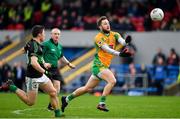 4 January 2020; Micheál Lundy of Corofin in action against Mark Cronin of Nemo Rangers during the AIB GAA Football All-Ireland Senior Club Championship semi-final match between Corofin and Nemo Rangers at Cusack Park in Ennis, Clare. Photo by Brendan Moran/Sportsfile