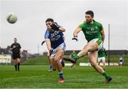 4 January 2020; Ben Brennan of Meath scores a point under pressure from Robert Pigott of Laois during the 2020 O'Byrne Cup Round 2 match between Meath and Laois at Pairc Tailteann in Navan, Meath. Photo by Harry Murphy/Sportsfile