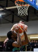 4 January 2020; Andre Berry of Garvey's Warriors Tralee is blocked by Stefan Zecevic of DBS Eanna during the Basketball Ireland Men's Superleague match between Garveys Warriors Tralee and DBS Eanna at Tralee Sports Complex in Tralee, Kerry. Photo by Brendan Moran/Sportsfile
