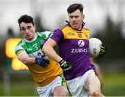 4 January 2020; Tom Byrne of Wexford in action against Eoin Rigney of Offaly during the 2020 O'Byrne Cup Round 2 match between Offaly and Wexford at Faithful Fields in Kilcormac, Offaly. Photo by Matt Browne/Sportsfile