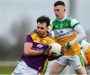 4 January 2020; Conor Devitt of Wexford in action against Cian Farrell of Offaly during the 2020 O'Byrne Cup Round 2 match between Offaly and Wexford at Faithful Fields in Kilcormac, Offaly. Photo by Matt Browne/Sportsfile