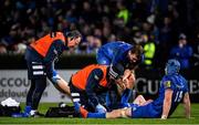 4 January 2020; Ryan Baird of Leinster is treated by Leinster Head of Medical Dr. John Ryan and Leinster Head physiotherapist Garreth Farrell during the Guinness PRO14 Round 10 match between Leinster and Connacht at the RDS Arena in Dublin. Photo by Ramsey Cardy/Sportsfile