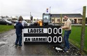 5 January 2020; Laois kitman John Kealy, left, and Borris in Ossory GAA Chairman Mick Delaney prepare the match scoreboard ahead of the 2020 Walsh Cup Round 3 match between Laois and Westmeath at O'Keeffe Park in Borris in Ossory, Laois. Photo by Ramsey Cardy/Sportsfile