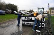 5 January 2020; Laois kitman John Kealy, left, and Borris in Ossory GAA Chairman Mick Delaney prepare the match scoreboard ahead of the 2020 Walsh Cup Round 3 match between Laois and Westmeath at O'Keeffe Park in Borris in Ossory, Laois. Photo by Ramsey Cardy/Sportsfile