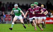 5 January 2020; TJ Reid of Ballyhale Shamrocks in action against Shane McGuigan, right, and Christopher McKaigue of Slaughtneil during the AIB GAA Hurling All-Ireland Senior Club Championship semi-final between Ballyhale Shamrocks and Slaughtnell at Pairc Esler in Newry, Co. Down. Photo by David Fitzgerald/Sportsfile