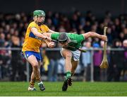 5 January 2020; Conor Boylan of Limerick in action against  Colin Guilfoyle of Clare during the Co-op Superstores Munster Hurling League 2020 Group A match between Clare and Limerick at O'Garney Park in Sixmilebridge, Clare. Photo by Harry Murphy/Sportsfile
