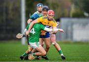 5 January 2020; Niall Deasy of Clare is tackled by Aaron Costello, Paddy O'Loughlin and David Reidy of Limerick during the Co-op Superstores Munster Hurling League 2020 Group A match between Clare and Limerick at O'Garney Park in Sixmilebridge, Clare. Photo by Harry Murphy/Sportsfile
