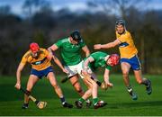 5 January 2020; Josh Considine and Paddy O'Loughlin of Limerick in action against Niall Deasy and Shane Golden of Clare during the Co-op Superstores Munster Hurling League 2020 Group A match between Clare and Limerick at O'Garney Park in Sixmilebridge, Clare. Photo by Harry Murphy/Sportsfile