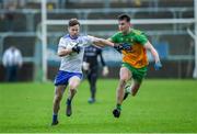 5 January 2020; Carl O'Conaill of Monaghan in action against Michael Langan of Donegal during the Bank of Ireland Dr McKenna Cup Round 2 match between Donegal and Monaghan at Páirc MacCumhaill in Ballybofey, Donegal. Photo by Philip Fitzpatrick/Sportsfile